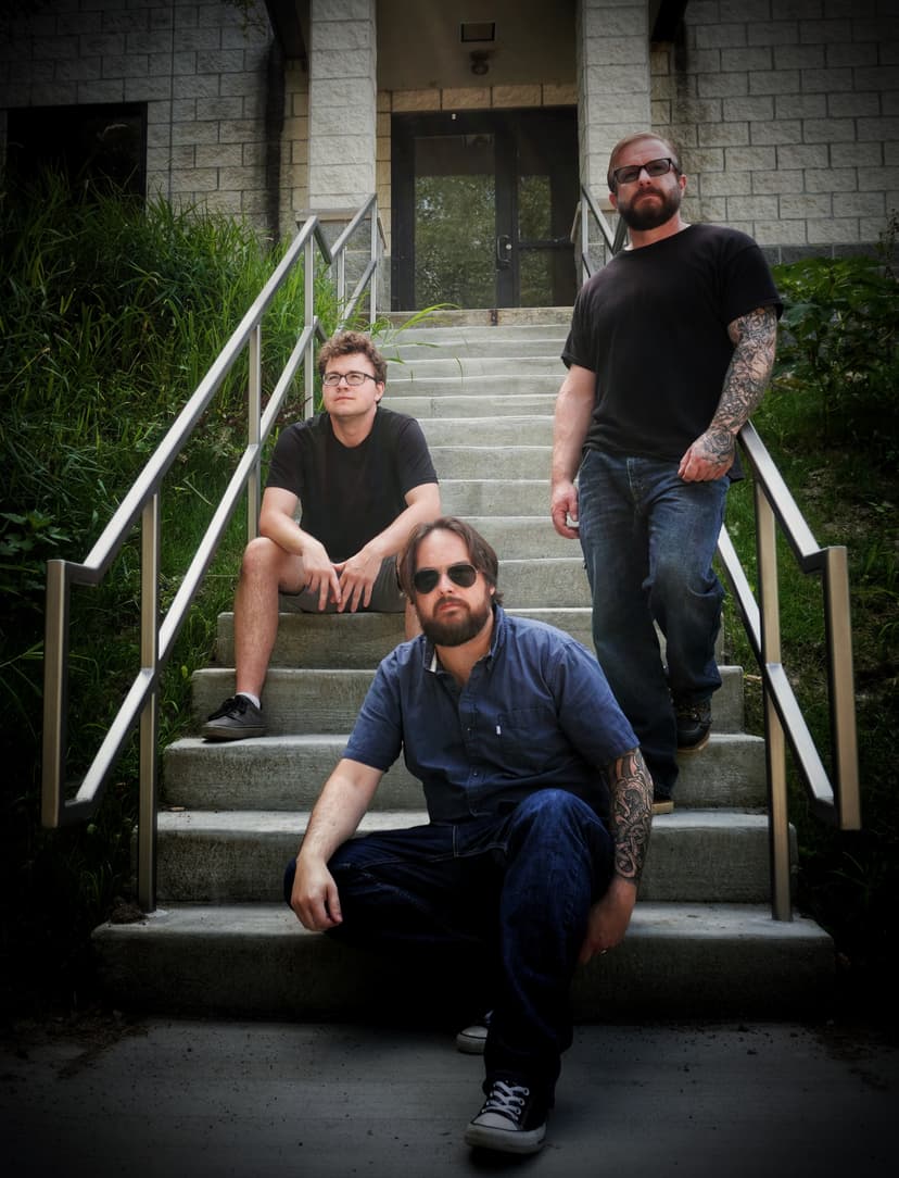 Sean Anthony Sullivan with band on stairs.